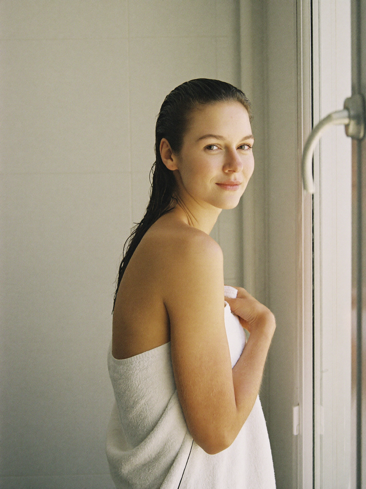 A woman with a towel after a shower